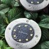 Kép 1/10 - Disk Lights 8 ledes napelemes nyomvonaljelölő lámpa készlet, hidegfehér