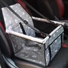 Kép 1/3 - Autós ülés kutyáknak, kutyaülés, kutyaszállító box szürke mancs mintával (pet-car-box-grey-paws-ch132)